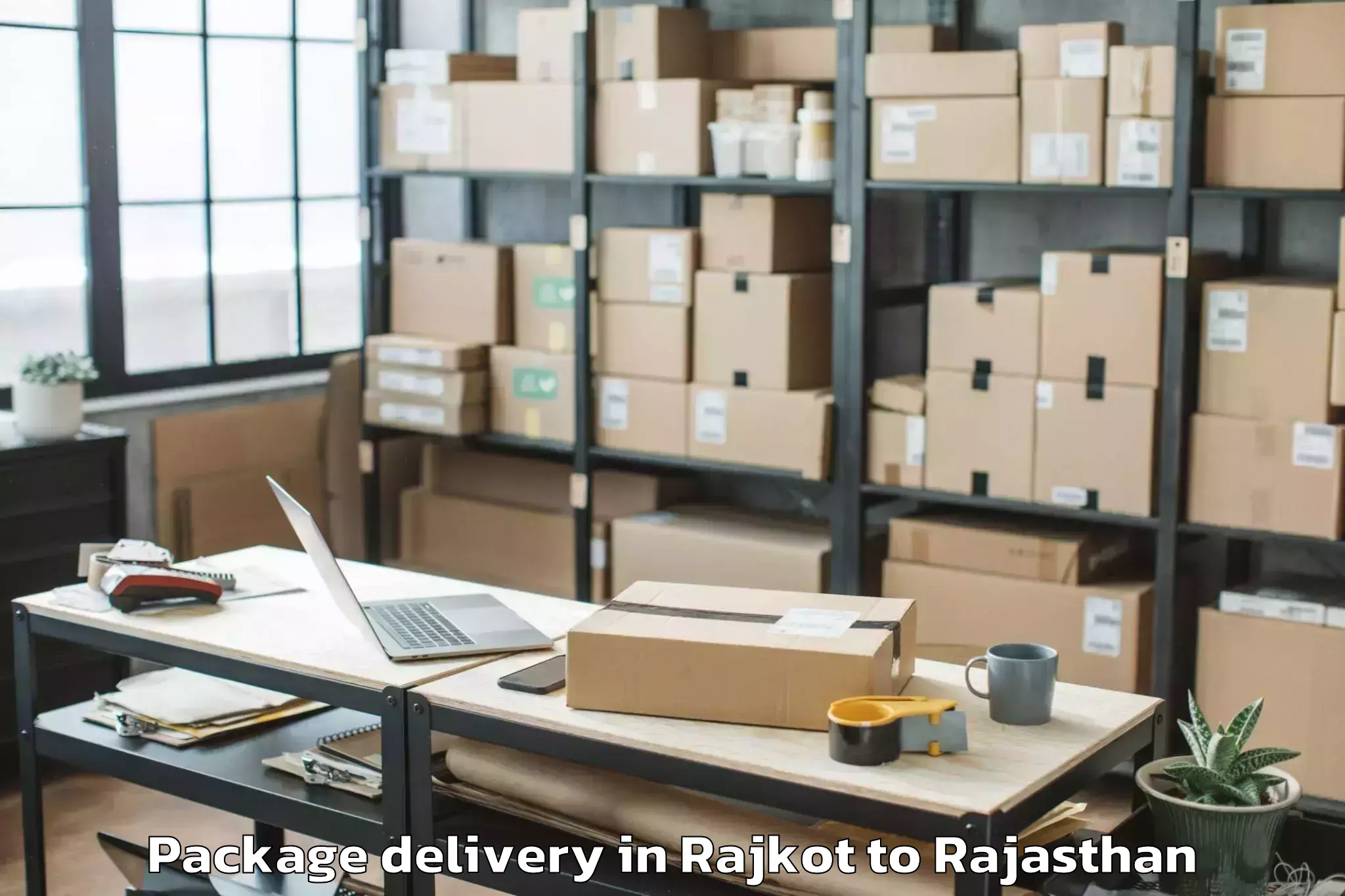 Expert Rajkot to Singhania University Jhunjhunu Package Delivery